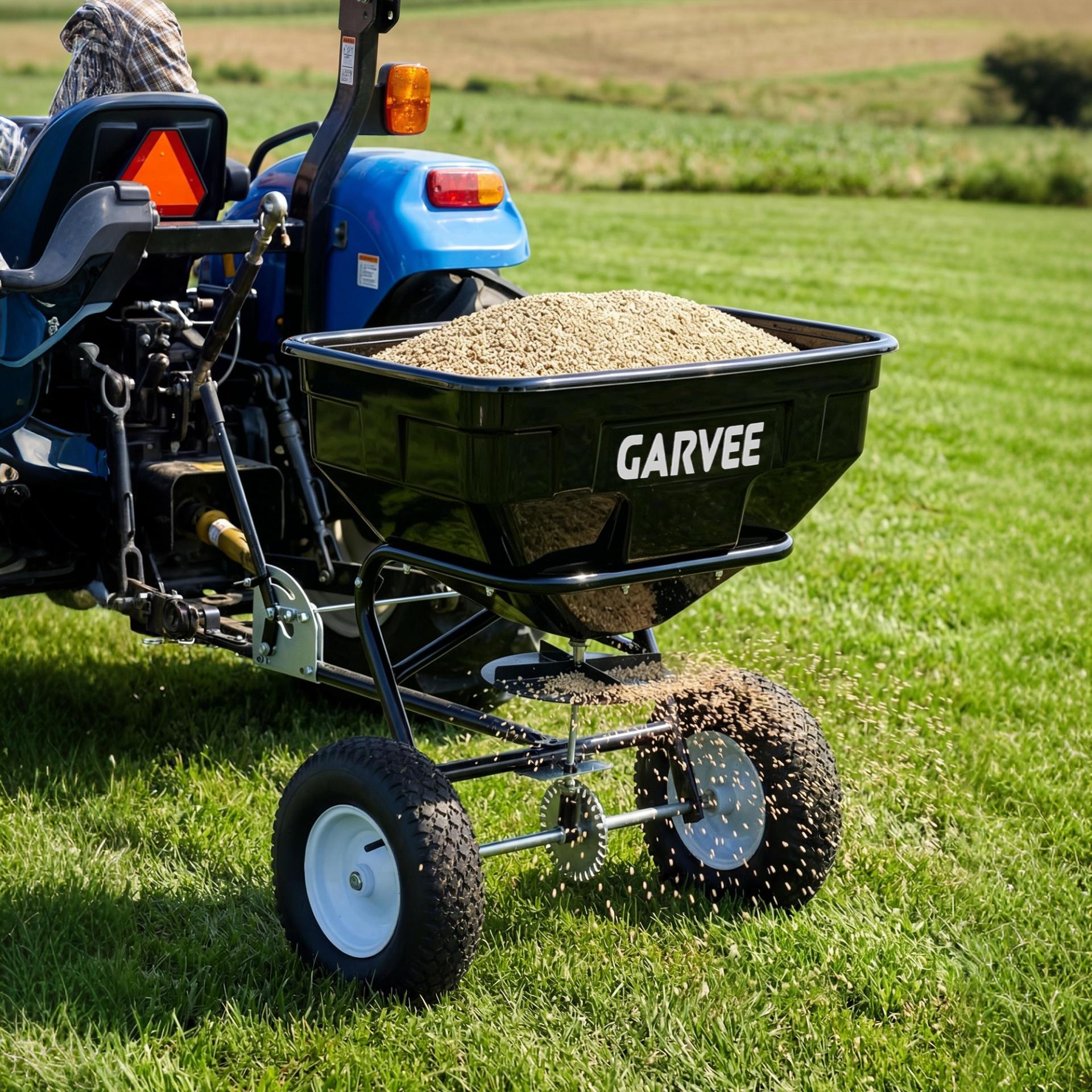 Garvee 130 lb Tow-Behind Broadcast Spreader, Heavy-Duty Lawn & Garden Spreader with 0–12 ft Coverage, Universal Hitch, 13" Pneumatic Tires & 20-Level Flow Control for ATV, UTV & Riding Mower, Black