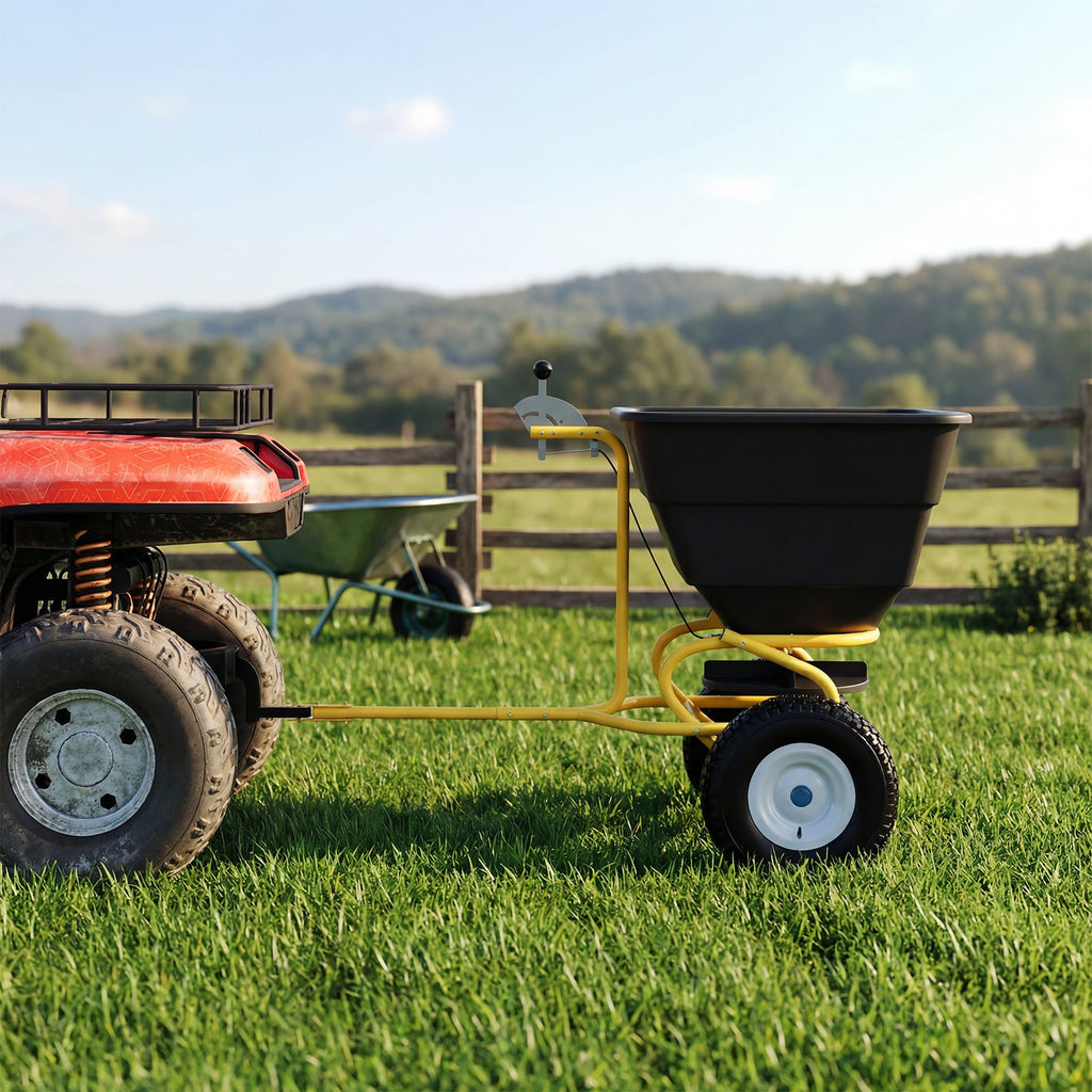 Garvee Tow-Behind Broadcast Spreader, 110 lbs Capacity with 10-Inch Pneumatic Tires, Universal Hitch and Feeder Cover for Seed, Fertilizer and Salt, Yellow